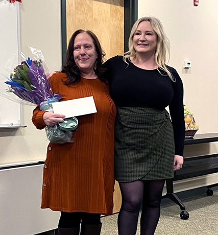 from left Marie posing with Malorie Greenspan, RN. Malorie is a former scholarship winner who transitioned from DSP to RN remaining part of the Team at NHR!